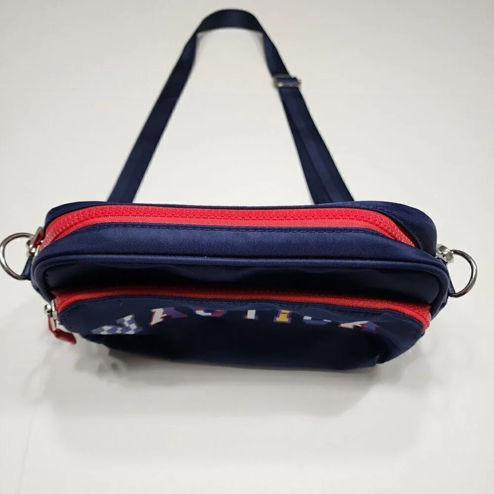 Nautica belt bag or crossbody Navy multi colored letters red zipper